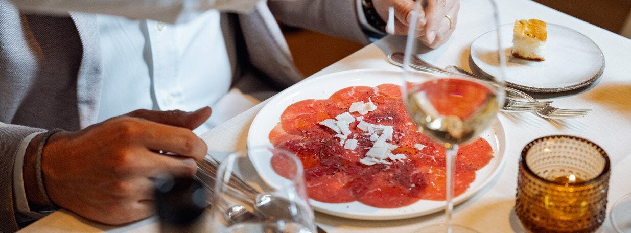 Carpaccio: Rindscarpaccio, Parmesan, Olivenöl